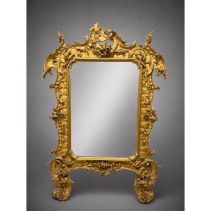 Specchiera in legno intagliato e dorato Germania Sec. XIX