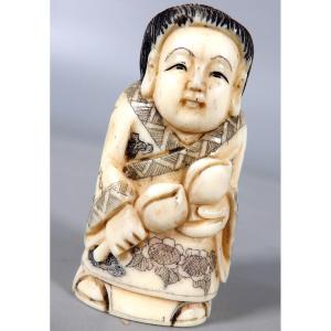 Ivory Netsuke - Young Man In Traditional Dress Holding Two Flowers - Signed
