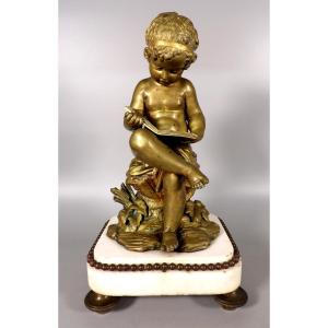 Bronze With A Gilt Patina On A White Marble Base - Studying Child