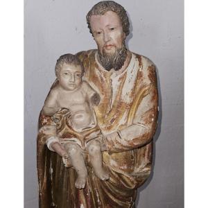 Statue Of St. Joseph Carrying The Infant Jesus - Polychrome Wood - 17th Century