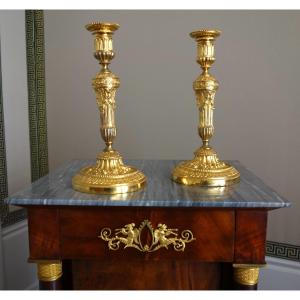 Pair Of Louis XVI Style Candlesticks In Chased And Gilded Bronze