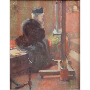 Woman Looking At A Painting. émile Auguste Wery (1868-1935)