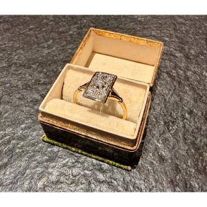 Yellow Gold And Platinum Ring With A Bezel Set With A Diamond 