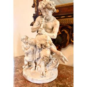 Terracotta Sculpture By Clodion Depicting A Faun Playing The Flute.
