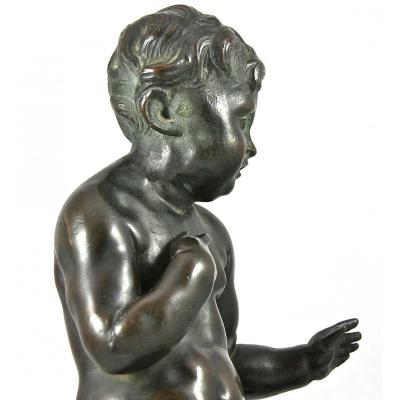 A Bronze Of XVIII Cherub Sitting