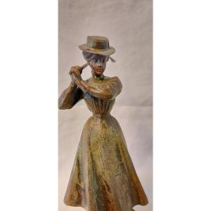 Elegant Golf Player With A Thin Waist In Polychrome Metal 