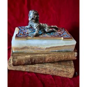 Child In Silvered Bronze On A Cloisonné Bronze "rug" Forming A Paperweight 