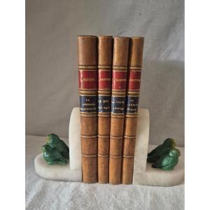 Pair Of Marble Bookends And Trios Of Polychrome Metal Parrots 