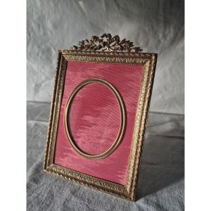 Bronze Cabinet-style Photo Frame With Oval Front And Pink Moiré. 