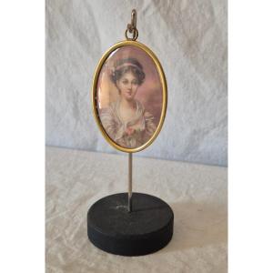 Oval Miniature Of A Young Girl With A Rose Painted On Ivory Late 19th Century
