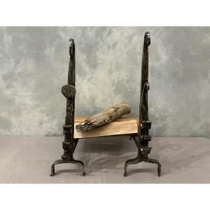 Pair Of Antique Polished Iron Andirons From The 18th Century