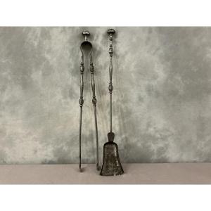 A Set Of A 19th-century Iron Fireplace Shovel And Tongs.