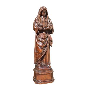 Statue Of Mary Magdalene With Arms Crossed