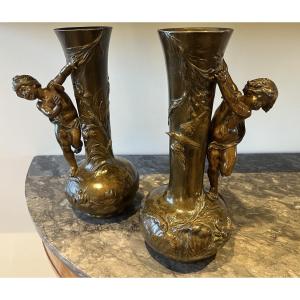 Jf Moreau. Pair Of Spelter Vases Decorated With Sculptures Of Young Children In The Round. Signed. 