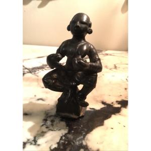 Small Bronze Representing A Probably A Hindu Deity Breastfeeding A Bird