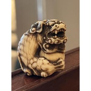 Netsuke In The Shape Of A Shishi In Marine Ivory, Kyoto School, Japan, Late Edo Period.