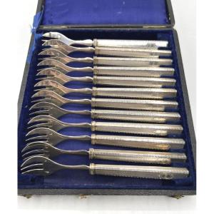 Suite Of 12 Solid Silver Oyster Forks