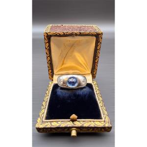Ring In 18 Carat Grey Gold, Cabochon Sapphire And Diamonds. 