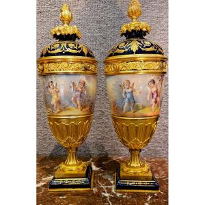 Pair Of Sèvres Vases Mounted In Gilded Bronzes