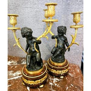 Pair Of Ormolu And Patinated Candelabra With Putti