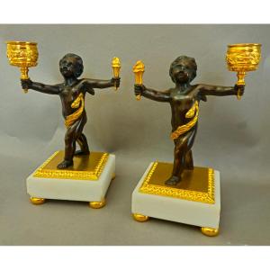 Pair Of Gilded And Patinated Bronze Candlesticks With Loves, Carrara Marble, 19th C.