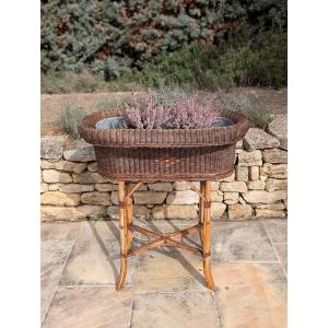 Planter On Legs Made Of Rattan And Bamboo.