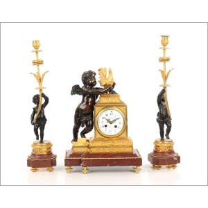 Antique Mantel Clock. Gilt And Patinated Bronze. France, 19th Century