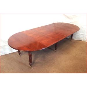 19th Century Round 6 Leg Mahogany Table With 4 Extensions.