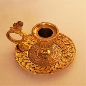 An Empire Period Hand Candlestick, Early 19th Century