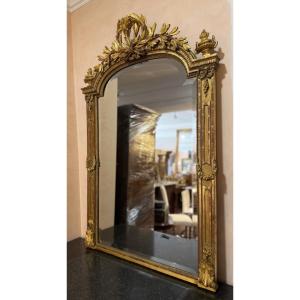 Specchiera da camino in legno intagliato e dorato, realizzata in stile Luigi Filippo