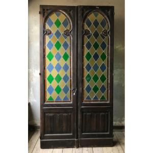 Porta vetrata raffinata con mosaico legato a piombo e telaio in rovere massello.