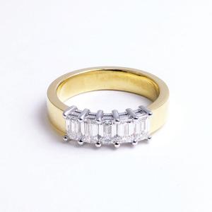 "emerald-cut Two-tone Ring: A Unique And Elegant Sparkle"