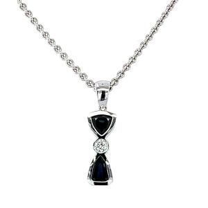 "18kt White Gold Pendant. With Sapphires And Diamond."