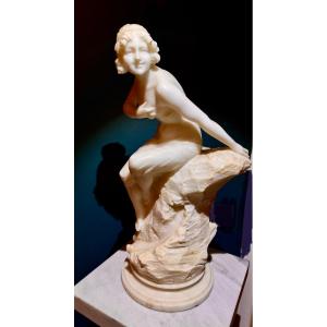 Alabaster Sculpture Of An Elegant Woman Seated On A Rock 