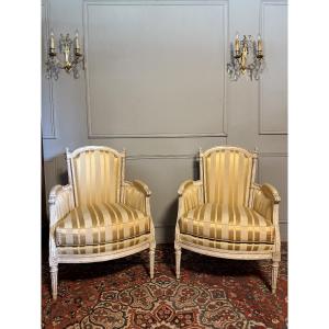 Pair Of Louis XVI Style Bergere Chairs In Painted Wood. 