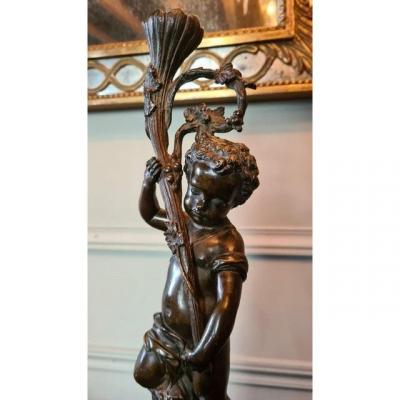 Pair Of Bronze Amours Candlesticks On Marble Column. XIX Th.