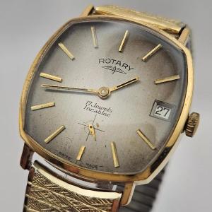 A Rotary Incabloc Gent's Wristwatch, With Rectangular Watch Head, On Grey/brown