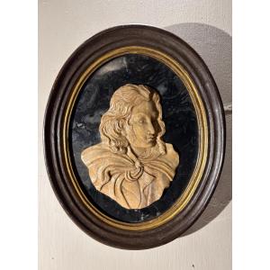 Portrait Of A Young Man In A Marble Medallion