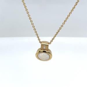 Opal And Diamond Pendant Mounted On 18k Yellow Gold