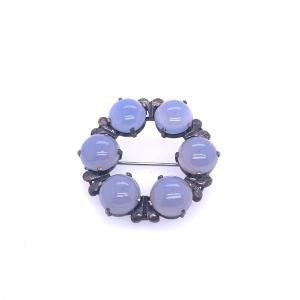 Circular Brooch In Cabochon-cut Mottled Blue Agate Set In Silver