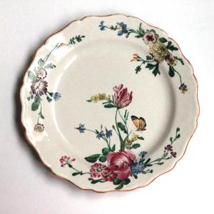 Earthenware Plate From Marseille With Floral Decoration, 18th Century.