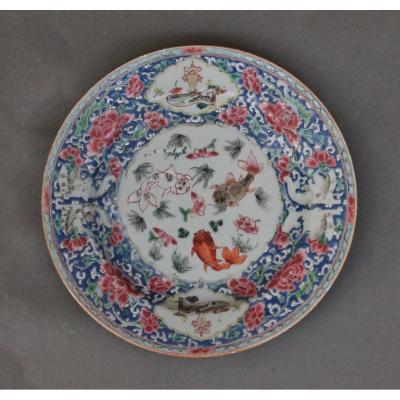Chinese Porcelain Plate Decorated With Fish, 18th Century.