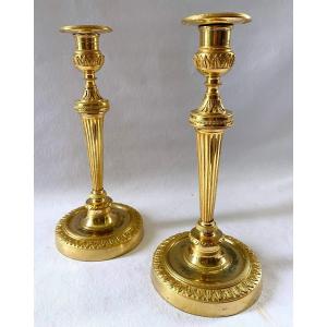 Louis XVI Period Candlesticks In Gilt Bronze