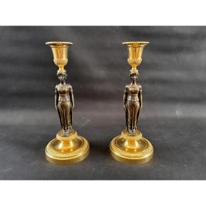Pair Of Empire-style Caryatid Candlesticks In Gilt And Patinated Bronze