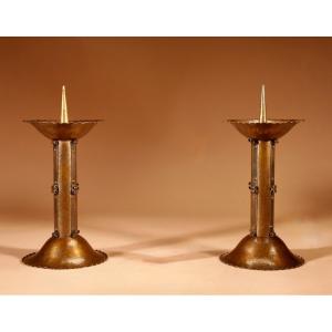 Amsterdam School Brass Pricket Patinated Candlesticks.