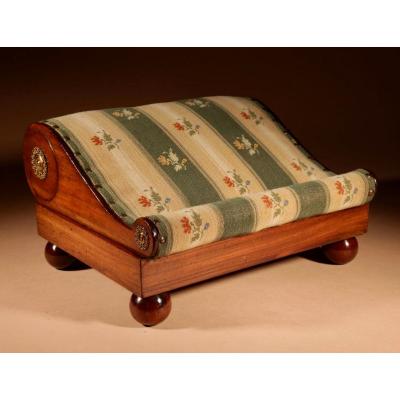 An Elegant Mahogany Foot Stool Continental Circa 1830.