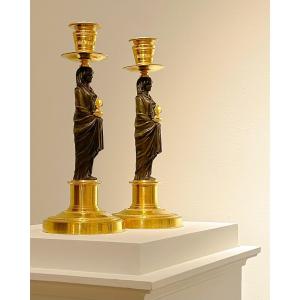 Pair Of Consulat Candlesticks In Gilt Bronze.