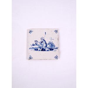 18th-century Delftware Tile Depicting A Farmer With A Flower Wreath