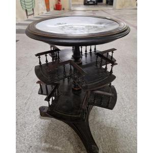 A Rotating Bookcase-style Pedestal Table By Alphonse Giroux