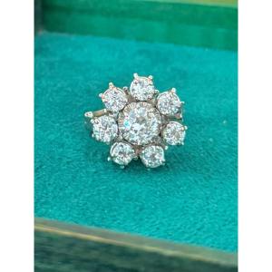 Daisy Ring In Platinum, And 2.75 Carats Of Diamonds.